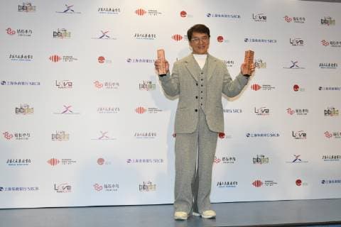 Hong Kong kungfu superstar Jackie Chan poses with his trophies during the 2018 Love Radio Music Awards ceremony in Shanghai, China, 26 September 2018. Jackie Chan wins big at Love Radio Music Awards in Shanghai  20180926_74506
