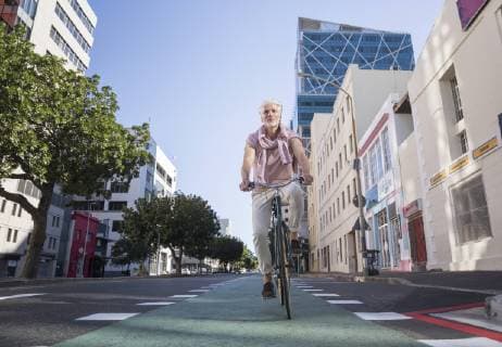 Mature man riding bicycle in the city model released Symbolfoto  WESTF23576