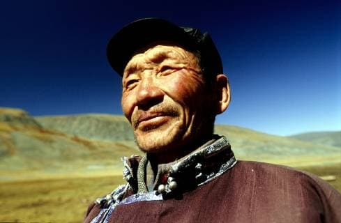Portrait of a Kazakh Nomad in traditional dressing. Most of the nomads living in the Tavanbogd Atlai National Park are Kazakhs., Tavanbogd National Park Mongolia Copyright: OlivierxRenck 7282600041