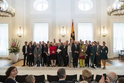 Federal President Frank Walter Steinmeier 11R and his wife Buedenbender 13R pose for a group photo with the recipient of the Cross of Merit of the Order of Merit of the Federal Republic of Germany at Bellevue Palace in Berlin on 2 October 2018 Award of Merit in Berlin