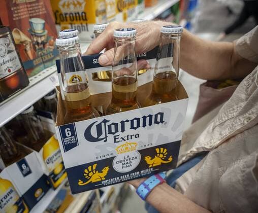 In advance of Constellation Brands earnings A shopper chooses a six-pack of Constellation Brands Corona Extra beer in a supermarket in New York on Tuesday, October 2, 2018. (  RichardxB.xLevine