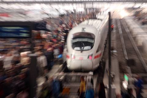 Due to an almost simultaneous arrival of two fully occupied ICE platform and station concourse are overcrowded Munich Bavaria Germany