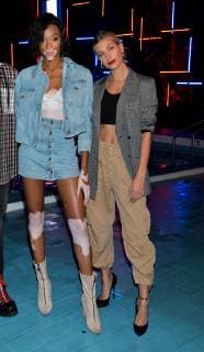 Model Winnie Harlow(L) and Hailey Baldwin attend the event Tommy Hilfiger Presents Tokyo Icons in Tokyo, Japan on October 8, 2018.  TKP2018100812 KEIZOxMORI