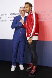 (L to R) American fashion designer Tommy Hilfiger and F1 racer Lewis Hamilton pose for the cameras during Tokyo Icons event on October 8, 2018, Tokyo, Japan. The American fashion brand presented its Fall 2018 collection in Tokyo inviting international and Japanese celebrities such as F1 race driver Lewis Hamilton and model and Justin Bieber s wife Hailey Baldwin.  (gxta_THJIcons015)