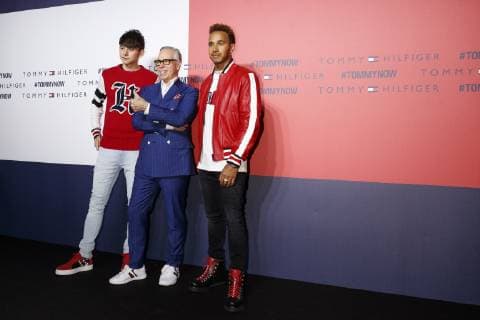 (L to R) Japanese TV personality Harry Sugiyama, American fashion designer Tommy Hilfiger and F1 racer Lewis Hamilton pose for the cameras during Tokyo Icons event on October 8, 2018, Tokyo, Japan. The American fashion brand presented its Fall 2018 collection in Tokyo inviting international and Japanese celebrities such as F1 race driver Lewis Hamilton and model and Justin Bieber s wife Hailey Baldwin.  (gxta_THJIcons036)