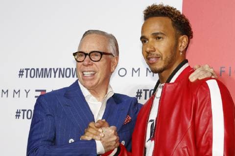 (L to R) American fashion designer Tommy Hilfiger and F1 racer Lewis Hamilton pose for the cameras during Tokyo Icons event on October 8, 2018, Tokyo, Japan. The American fashion brand presented its Fall 2018 collection in Tokyo inviting international and Japanese celebrities such as F1 race driver Lewis Hamilton and model and Justin Bieber s wife Hailey Baldwin.  (gxta_THJIcons043)