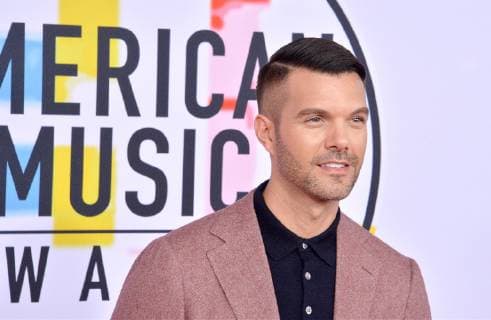 TV personality AJ Gibson arrives for the 46th annual American Music Awards at the Microsoft Theater in Los Angeles on October 9, 2018.  LAP20181009167 JIMxRUYMEN