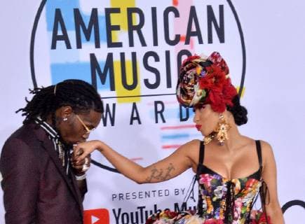 Singers Offset (L) and Cardi B arrive for the 46th annual American Music Awards at the Microsoft Theater in Los Angeles on October 9, 2018.  LAP20181009254 JIMxRUYMEN