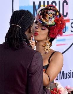 Singers Offset (L) and Cardi B arrive for the 46th annual American Music Awards at the Microsoft Theater in Los Angeles on October 9, 2018.  LAP20181009260 JIMxRUYMEN