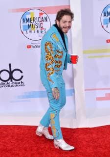 Rapper Post Malone arrives for the 46th annual American Music Awards at the Microsoft Theater in Los Angeles on October 9, 2018.  LAP20181009450 JIMxRUYMEN