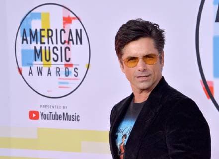 Actor John Stamos arrives for the 46th annual American Music Awards at the Microsoft Theater in Los Angeles on October 9, 2018.  LAP20181009447 JIMxRUYMEN