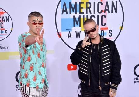 Bad Bunny (L) and J Balvin arrive for the 46th annual American Music Awards at the Microsoft Theater in Los Angeles on October 9, 2018.  LAP20181009489 JIMxRUYMEN