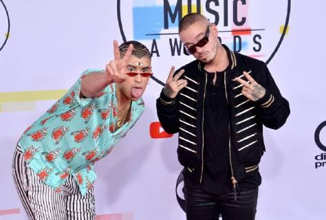 Bad Bunny (L) and J Balvin arrive for the 46th annual American Music Awards at the Microsoft Theater in Los Angeles on October 9, 2018.  LAP20181009491 JIMxRUYMEN