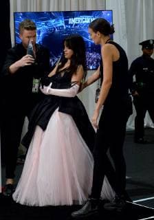 Singer Camila Cabello appears backstage with her award for New Artist of the Year presented by Capital One Savor Card, during the 46th annual American Music Awards at the Microsoft Theater in Los Angeles on October 9, 2018.  LAP20181009613 JIMxRUYMEN