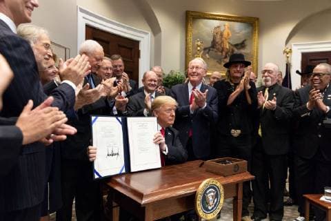 October 11, 2018 - Washington, DC, United States of America - U.S President Donald Trump shows his signature during a signing ceremony for the Music Modernization Act in the Roosevelt Room of the White House October 11, 2018 Washington, DC. Washington United States of America - ZUMAp138 20181011_zaa_p138_021 Copyright: xJoycexN.xBoghosianx