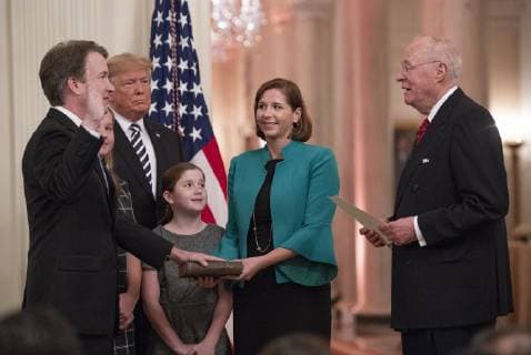October 8, 2018 - Washington, District of Columbia, U.S. - As his family and United States President Donald J. Trump look on, Associate Justice of the Supreme Court Brett Kavanaugh takes the Judicial Oath from former Associate Justice of the Supreme Court Anthony M. Kennedy during a ceremonial swearing-in ceremony in the East Room of the White House in Washington, DC on Monday, October 8, 2018. Kavanaugh formally took the oath on Saturday, hours after he was confirmed by the US Senate. Washington U.S.  - ZUMAc306 20181008_zaa_c306_037 Copyright: xRonxSachsx