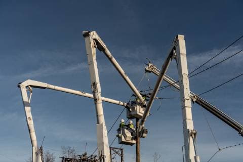 Employees of Gulf Power work at restoring power after Hurricane Michael slammed into Panama City October 12, 2018. Michael hit the Florida coast October 10 as a Category 4 near Mexico Beach as the most powerful storm to hit the southern US state in more than a century. Michael made landfall around 1:00 pm Eastern time (1700 GMT), the National Hurricane Center said.  WAP20181012046 KENxCEDENO