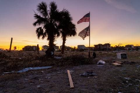Two American flags were posted among the damaged and destroyed homes after Hurricane Michael slammed into Mexico Beach, Florida October 12, 2018. Michael hit the Florida panhandle October 10.  WAP20181012066 KENxCEDENO