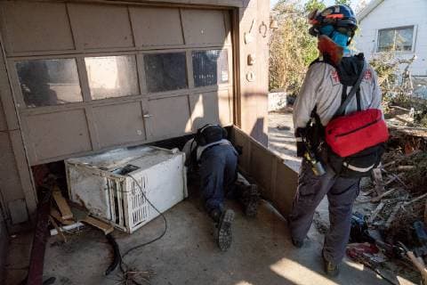 South Florida Task Force Two Search and Rescue Team checks homes for survivors after Hurricane Michael hit the Florida panhandle and worst Mexico Beach, Florida October 13, 2018.  WAP20181013508 KENxCEDENO