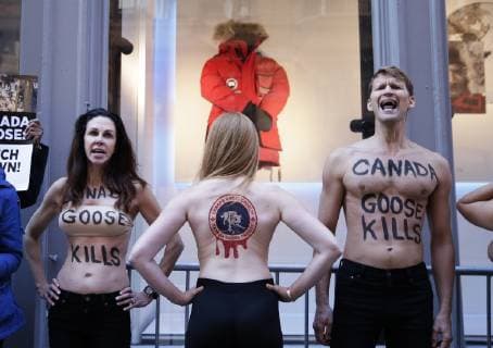 Topless Activists and PETA supporters hold a protest outside of Canada Goose in New York City on October 18, 2018.  NYP20181018103 JOHNxANGELILLO