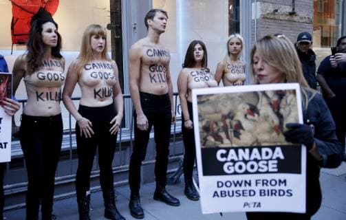 Topless Activists and PETA supporters hold a protest outside of Canada Goose in New York City on October 18, 2018.  NYP20181018105 JOHNxANGELILLO