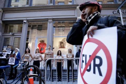 Topless Activists and PETA supporters hold a protest outside of Canada Goose in New York City on October 18, 2018.  NYP20181018107 JOHNxANGELILLO