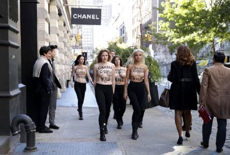 Topless Activists and PETA supporters arrive to hold a protest outside of Canada Goose in New York City on October 18, 2018.  NYP20181018112 JOHNxANGELILLO