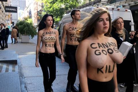 October 18, 2018 - New York City, New York, US - American animal rights organization, People for the Ethical Treatment of Animals (PETA) staged a protest action outside of Canada GooseÃ¢â‚¬â ¢s SOHO store on 18th. October 2018, highlighting the use of animal fur in the outer winter-wear company product line. New York City US - ZUMAl135 20181018_zap_l135_010 Copyright: xG.xRonaldxLopezx