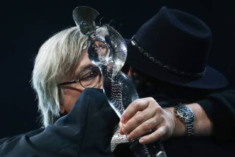 MOSCOW, RUSSIA - OCTOBER 22, 2018: Stage director Dmitry Krymov (L) awarded the Best Stage Production prize for Without a Dowry, and Crystal Turandot Award President Boris Belenky at a ceremony for the 27th Crystal Turandot Award, an independent theatre prize, held at Moscow s Vakhtangov Theatre. Valery Sharifulin TASS  TS094CD1