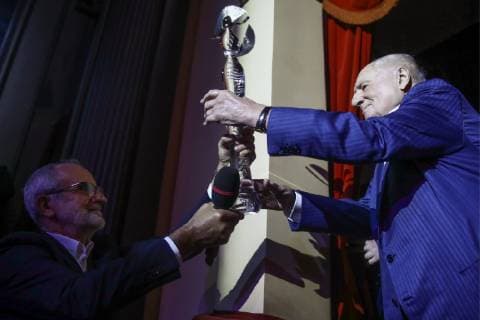 MOSCOW, RUSSIA - OCTOBER 22, 2018: Vakhtangov Theatre Artistic Director Rimas Tuminas awards the special prize to Lenkom Theatre Artistic Director Mark Zakharov at a ceremony for the 27th Crystal Turandot Award, an independent theatre prize, held at Moscow s Vakhtangov Theatre. Valery Sharifulin TASS  TS094C6E