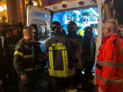 ROME, ITALY - OCTOBER 23, 2018: Firefighters and emergency service workers outside the Repubblica underground station; some 30 people including CSKA Moscow fans from Russia have been injured in an escalator accident at the Repubblica underground station; Rome is hosting a UEFA Champions League Group Stage football match between CSKA Moscow and Roma. Vera Shcherbakova TASS  TS094EE9