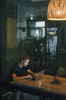 Man working overtime in his own start up business model released Symbolfoto property released  GUSF01215