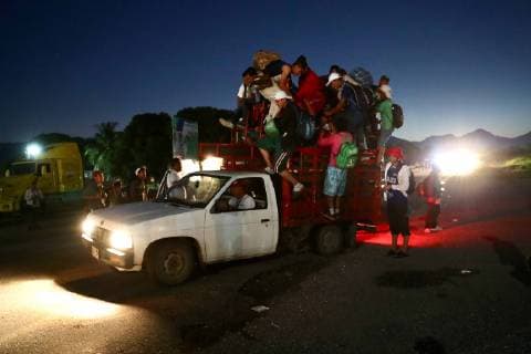October 25 2018 Mepastepec Mexico Migrants get into a truck in the early morning hours to their next destination of Pijijiapan Mepastepec Mexico  - ZUMAu78_ 20181025_zaf_u78_030 Copyright: xValentexRosasx