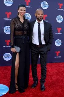 Actor Amaury Nolasco (R) and guest arrive for the fourth annual Latin American Music Awards at the Dolby Theatre in the Hollywood section of Los Angeles on October 25, 2018. The annual event honors outstanding achievements for artists in the Latin music industry.  LAP20181025178 JIMxRUYMEN