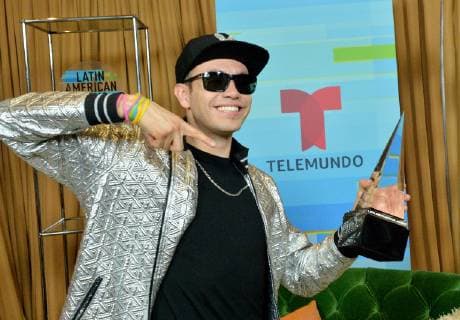 Raymix appears backstage with his award for Favorite Regional Mexican Song for Oye Mujer, at the fourth annual Latin American Music Awards at the Dolby Theatre in the Hollywood section of Los Angeles on October 25, 2018. The annual event honors outstanding achievements for artists in the Latin music industry.  LAP20181025303 JIMxRUYMEN