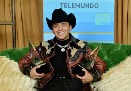 Christian Nodal appears backstage with his awards for Favorite Regional Mexican Artist and Favorite Regional Mexican Album for Me Deje Llevar, at the fourth annual Latin American Music Awards at the Dolby Theatre in the Hollywood section of Los Angeles on October 25, 2018. The annual event honors outstanding achievements for artists in the Latin music industry.  LAP20181025321 JIMxRUYMEN