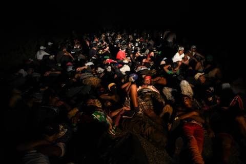 October 27, 2018 - San Pedro Tapantepec, Oaxaca, Mexico - A caravan of Central American migrants walked and hitchhiked trying to reach the town of Tapantepec in Oaxaca state, Saturday. migrants lay on the ground during a momentarly blockage by the Mexican federal police. President Trump has vowed to stop them. San Pedro Tapantepec Mexico - ZUMAl113 20181027_zap_l113_009 Copyright: xMiguelxJuarezxLugox