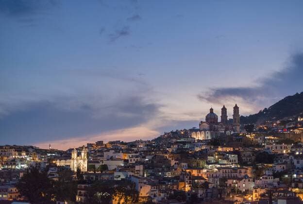 Panoramic view of Taxco de Alarcon at dusk in Guerrero, Mexico., Taxco de Alarcon Guerrero Mexico Copyright: MarcosxFerro FEMR000098