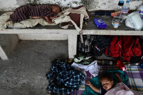 October 29, 2018 - Santiago Niltepec, Oaxaca, Mexico - Two babies sleep, as Central American migrants continue d their trek accross Mexico toward the US, to the town of Santiago Niltepec in Oaxaca state on Monday. As the number of migrants in the caravan has dropped as people become discouraged or too tired to carry on, President Trump is planning to send 5200 American troops to the border to stop what he calls an Ã¢â‚¬oeinvasion. Santiago Niltepec Mexico - ZUMAl113 20181029_zap_l113_013 Copyright: xMiguelxJuarezxLugox