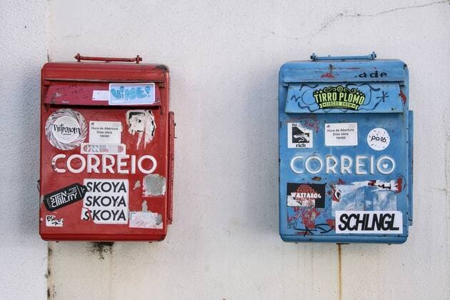 Red and blue mailbox in the Alfama Lisbon district Portugal