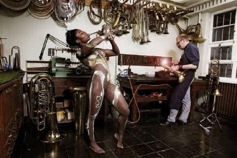 From the FARBKÖRPER Bodypainting Facettes Calendar 2019 Musical Instruments Workshop Photoshooting with Model Clementine as a musical instrument with metal wind instrument maker Detlef in the workshop of the company Armin Werner Musical Instruments in Hannover FARBKÖRPER is a project of the photographer Tschiponnique Skupin showing the versatility of bodypainting Painting by Jörg Düsterwald Foto:xT.xSkupinx xFuturexImage
