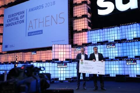 November 6, 2018 - Lisbon, Portugal - European Commissioner for Research, Science and Innovation Carlos Moedas gives the prize money to Mayor of Athens Georgios Kaminis after announcing Athens as the winner of the European Capital of Innovation prize during the Web Summit 2018 in Lisbon, Portugal on November 6, 2018. Lisbon Portugal - ZUMAf123 20181106_zap_f123_006 Copyright: xPedroxFiuzax