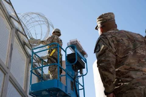 November 7, 2018 - Nogales, AZ, United States of America - U.S. Army soldiers install concertina wire along the Mexico border at the Nogales DeConcini Port November 6, 2018 Nogales, Arizona. The troops are deploying to the U.S. - Mexico border by order of President Donald Trump to intercept the Honduran migrant caravan. Nogales United States of America - ZUMAp138 20181107_zaa_p138_009 Copyright: xJerryxGlaserx