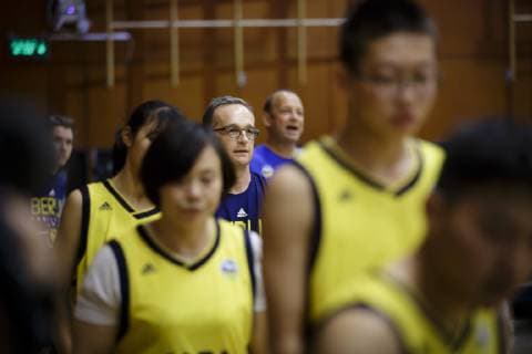 Federal Foreign Minister Heiko Maas SPD meets German and Chinese youths as part of basketball training under the direction of Alba Berlin at the German Embassy School Beijing 12 11 2018 Beijing Beijing China Copyright: xIngaxKjerx