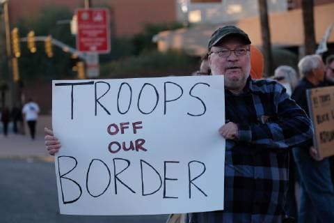 November 13, 2018 - Tucson, Arizona, USA - Pro immigrants rights protest in Tucson in support of the migrant caravan traveling through Mexico towards the US border. They denounced the stationing of US troops by President Trump on the border to hault the caravan if they reach the Arizona and support the migrants rights to apply for asylum. Tucson USA - ZUMAb411 20181113_zap_b411_006 Copyright: xChristopherxBrownx