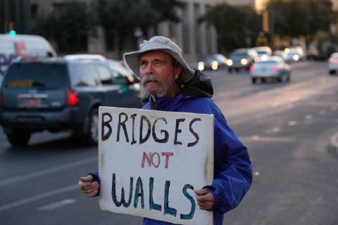 November 13, 2018 - Tucson, Arizona, USA - Pro immigrants rights protest in Tucson in support of the migrant caravan traveling through Mexico towards the US border. They denounced the stationing of US troops by President Trump on the border to hault the caravan if they reach the Arizona and support the migrants rights to apply for asylum. Tucson USA - ZUMAb411 20181113_zap_b411_007 Copyright: xChristopherxBrownx