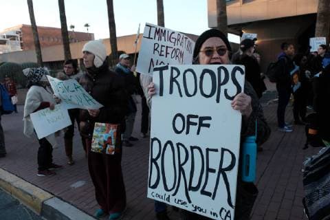 November 13, 2018 - Tucson, Arizona, USA - Pro immigrants rights protest in Tucson in support of the migrant caravan traveling through Mexico towards the US border. They denounced the stationing of US troops by President Trump on the border to hault the caravan if they reach the Arizona and support the migrants rights to apply for asylum. Tucson USA - ZUMAb411 20181113_zap_b411_008 Copyright: xChristopherxBrownx