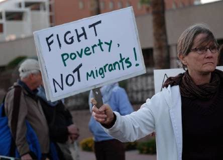 November 13, 2018 - Tucson, Arizona, USA - Pro immigrants rights protest in Tucson in support of the migrant caravan traveling through Mexico towards the US border. They denounced the stationing of US troops by President Trump on the border to hault the caravan if they reach the Arizona and support the migrants rights to apply for asylum. Tucson USA - ZUMAb411 20181113_zap_b411_010 Copyright: xChristopherxBrownx