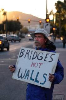 November 13, 2018 - Tucson, Arizona, USA - Pro immigrants rights protest in Tucson in support of the migrant caravan traveling through Mexico towards the US border. They denounced the stationing of US troops by President Trump on the border to hault the caravan if they reach the Arizona and support the migrants rights to apply for asylum. Tucson USA - ZUMAb411 20181113_zap_b411_013 Copyright: xChristopherxBrownx