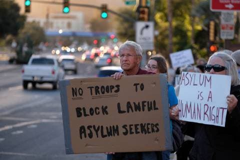 November 13, 2018 - Tucson, Arizona, USA - Pro immigrants rights protest in Tucson in support of the migrant caravan traveling through Mexico towards the US border. They denounced the stationing of US troops by President Trump on the border to hault the caravan if they reach the Arizona and support the migrants rights to apply for asylum. Tucson USA - ZUMAb411 20181113_zap_b411_015 Copyright: xChristopherxBrownx